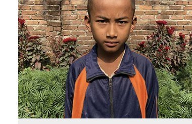 Unesh Chaudhary, age 11, from Kudi, Nepal